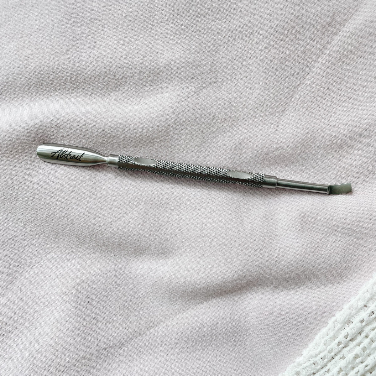 abstract-nagelriem-duwer-nagelriem-achteruit-duwen